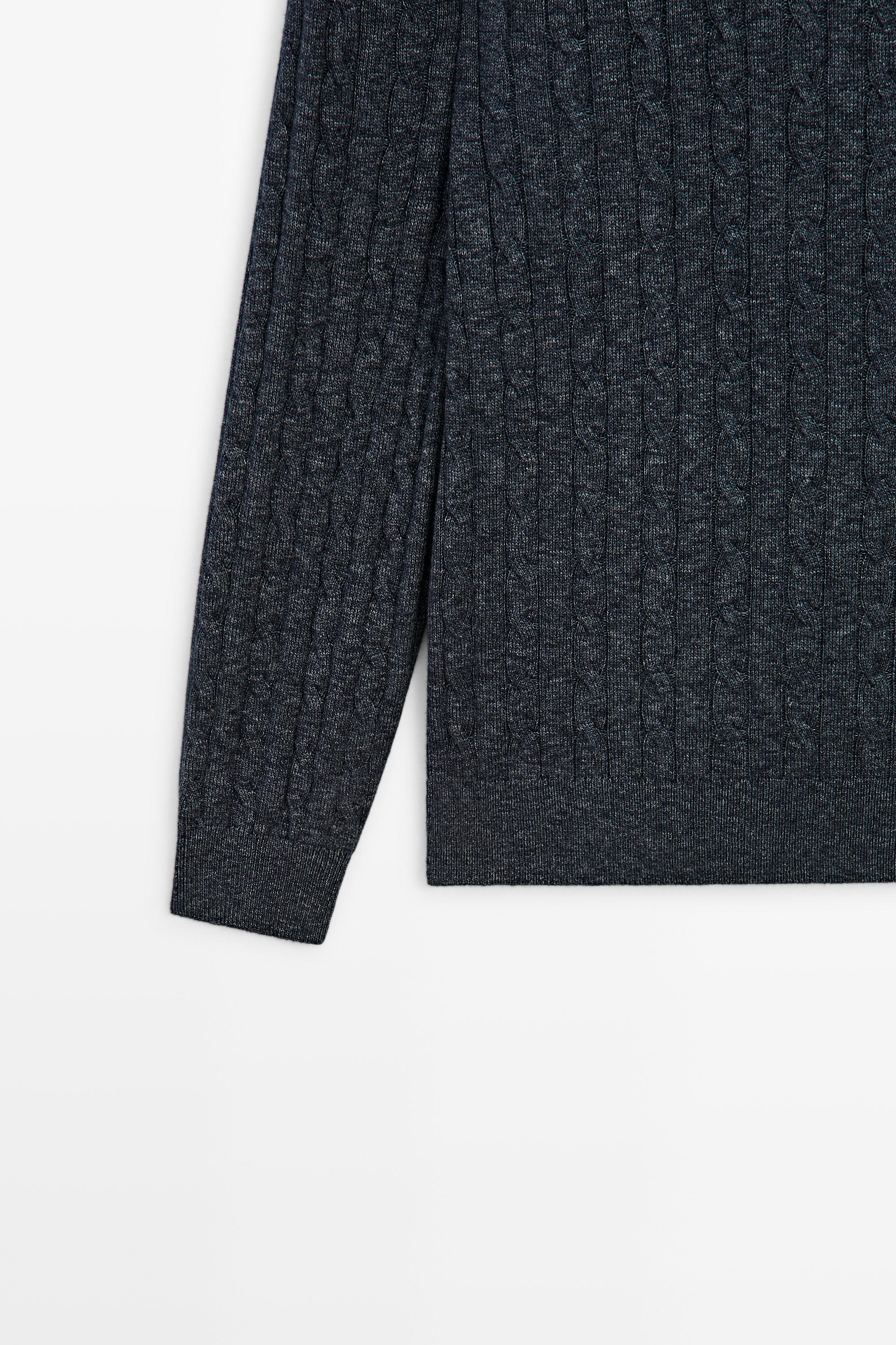 Cable knit round neck sweater